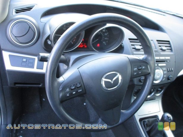 2011 Mazda MAZDA3 i Touring 4 Door 2.0 Liter DOHC 16-Valve VVT 4 Cylinder 5 Speed Manual