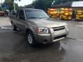 2004 Nissan Frontier XE King Cab Photo 1