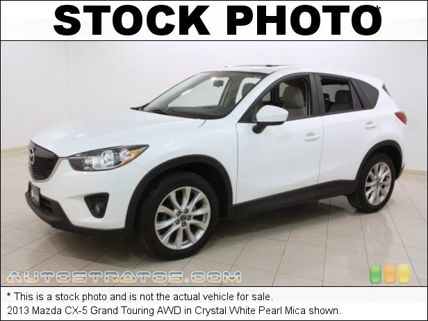 Stock photo for this 2013 Mazda CX-5 Grand Touring AWD 2.0 Liter DI SKYACTIV-G DOHC 16-Valve VVT 4 Cylinder 6 Speed SKYACTIV Automatic